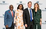 Image of Rebecca Jarvis, President Eden, Deborah Roberts and Al Roker in front of a step and repeat of Landmark College logos at the 2024 gala fundraiser